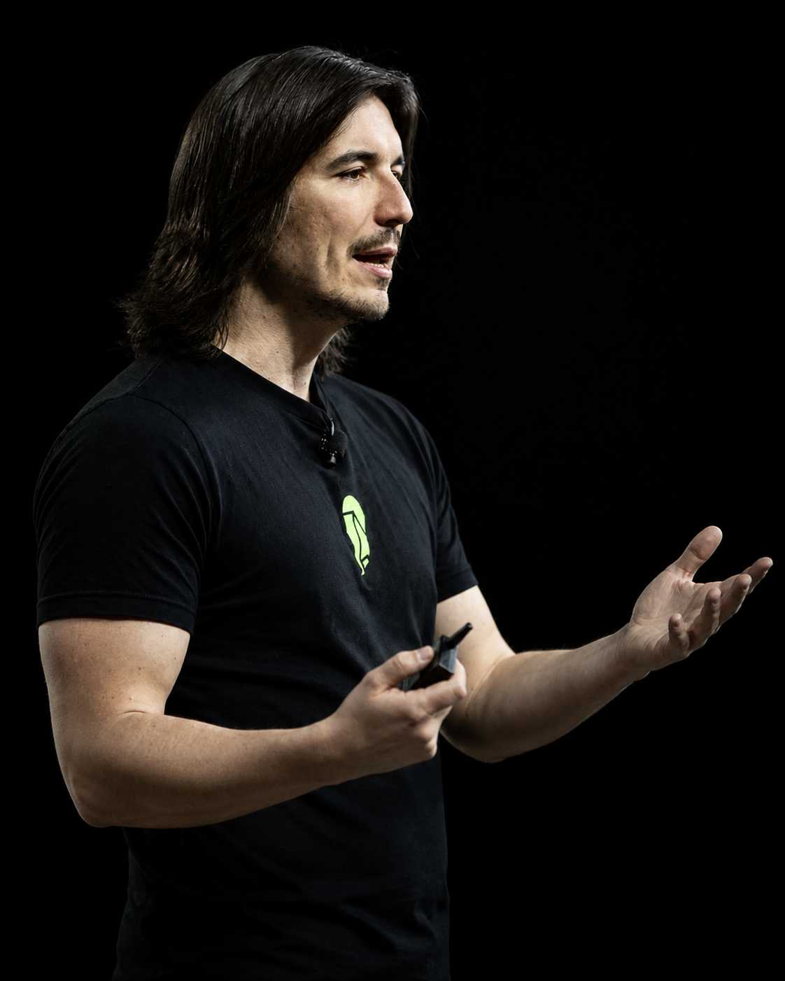 Editorial treatment of Vlad Tenev presenting Robinhood Wallet